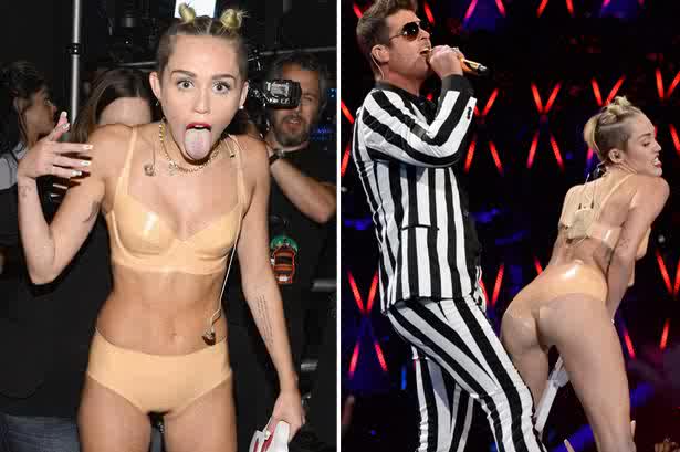 Miley cyrus photos half naked