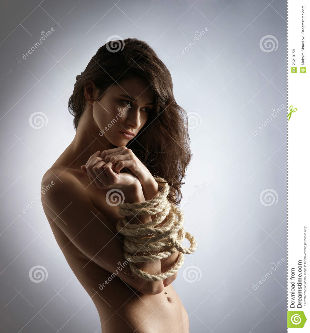 Woman naked in ropes